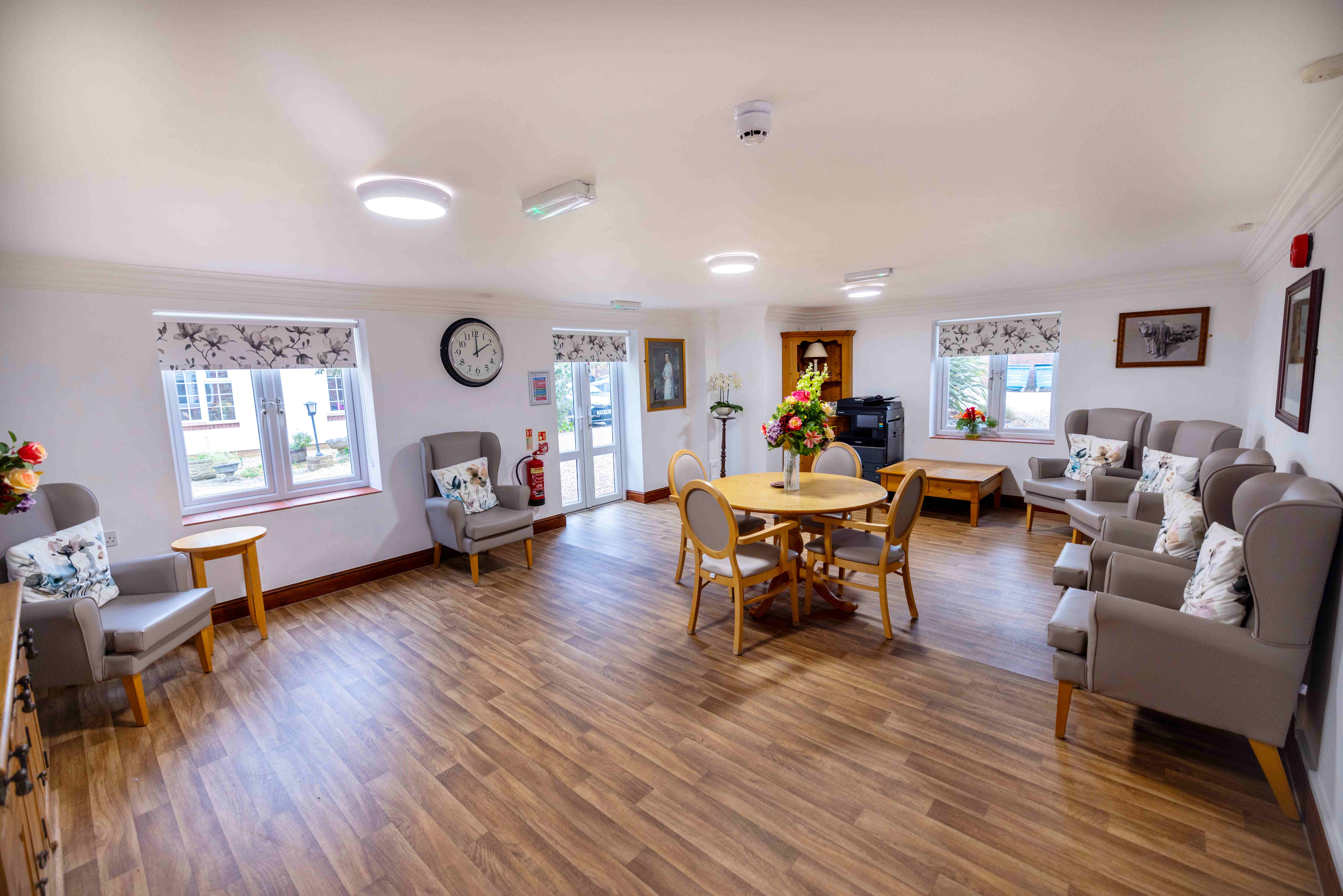 Welcoming community lounge with multiple seating areas