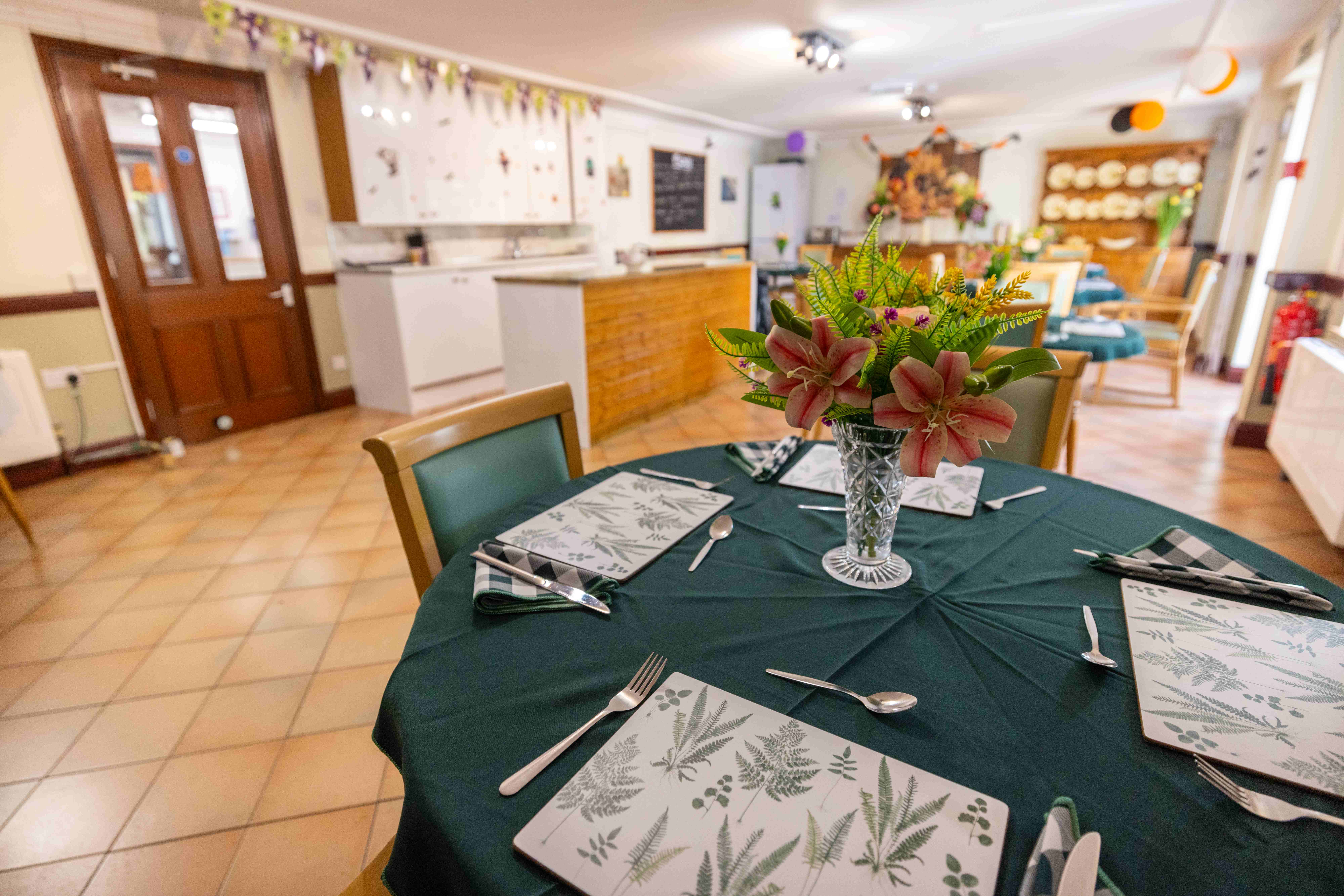 Dining room at Lower Farm with elegant table settings